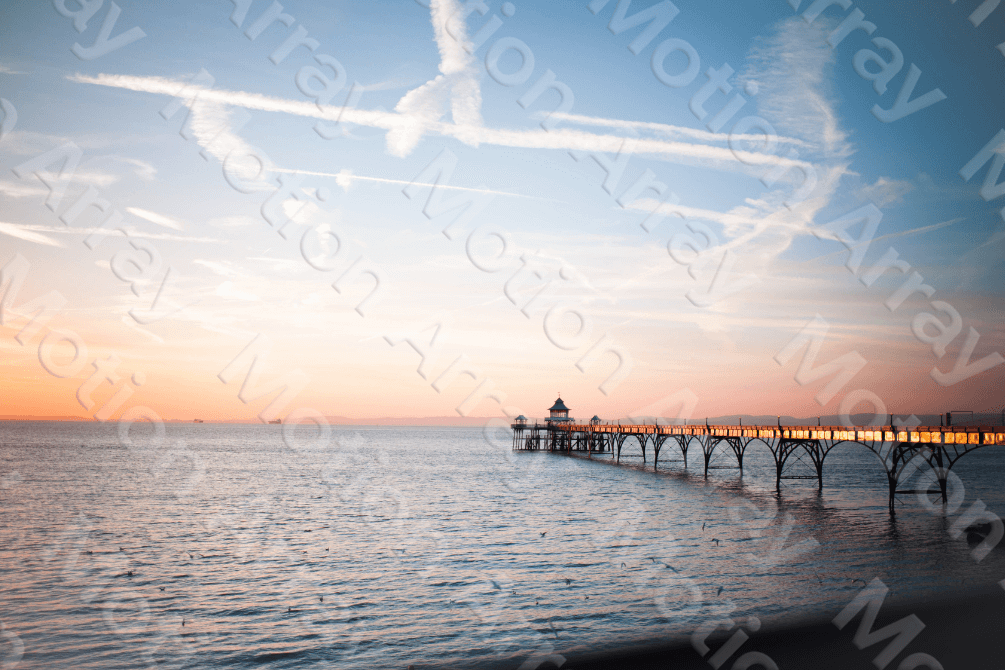 how to photograph architecture of a pier at sunset